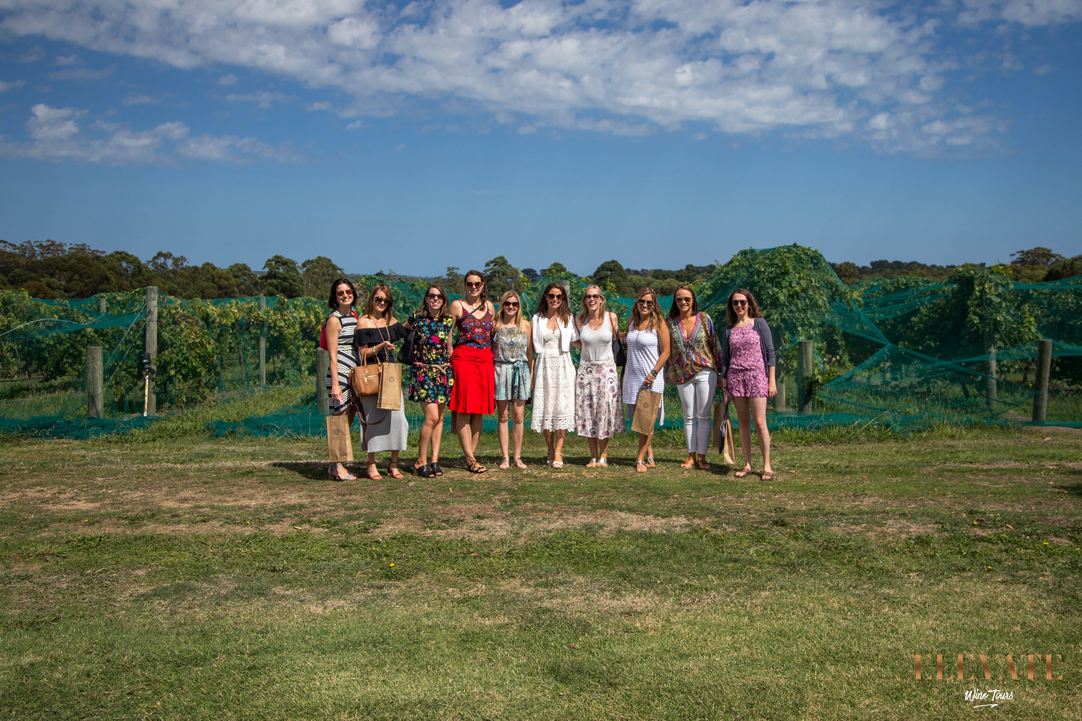 Standing in front of the vines at Stumpy Gully Vineyard