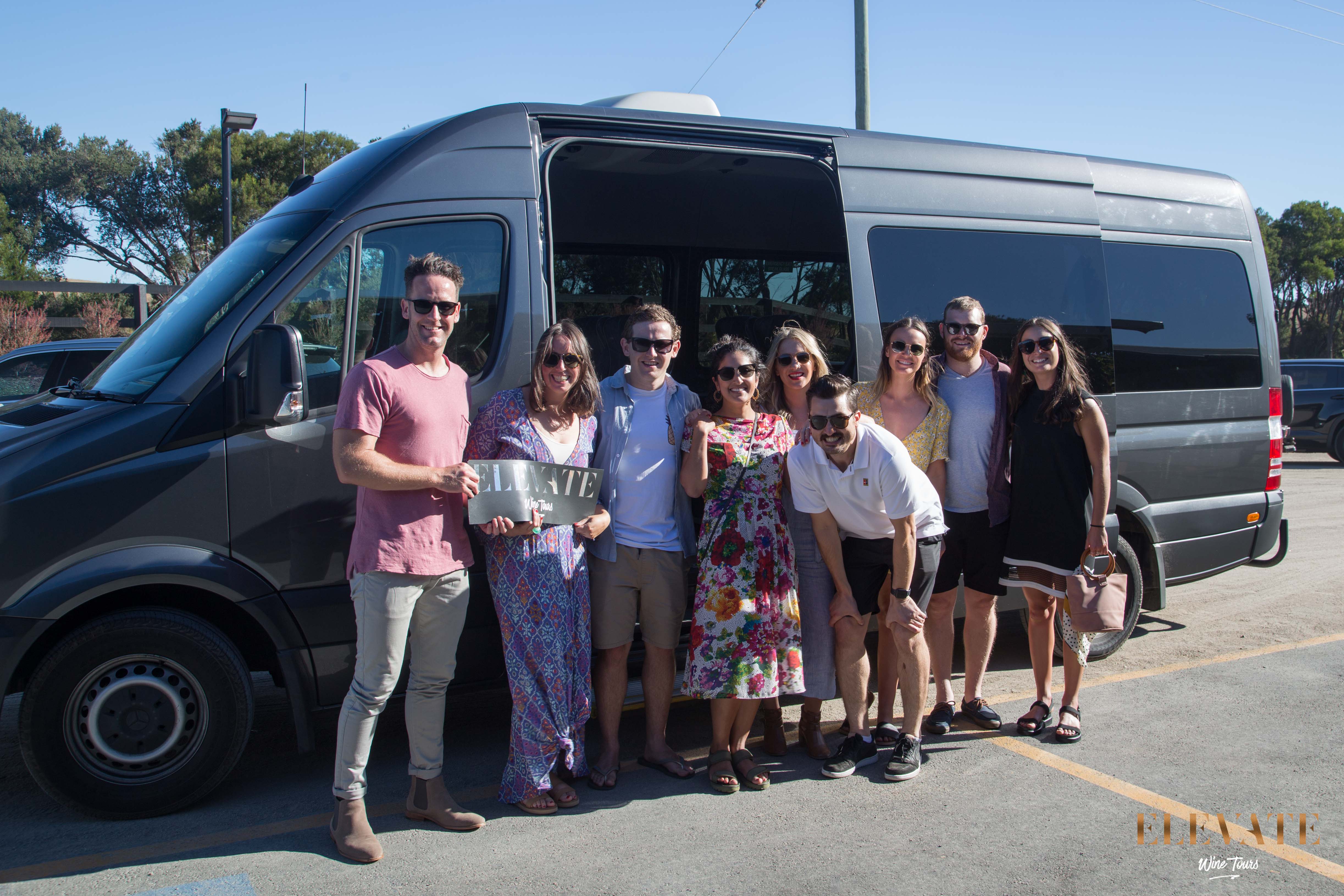 Picture of wine tour group in front of van